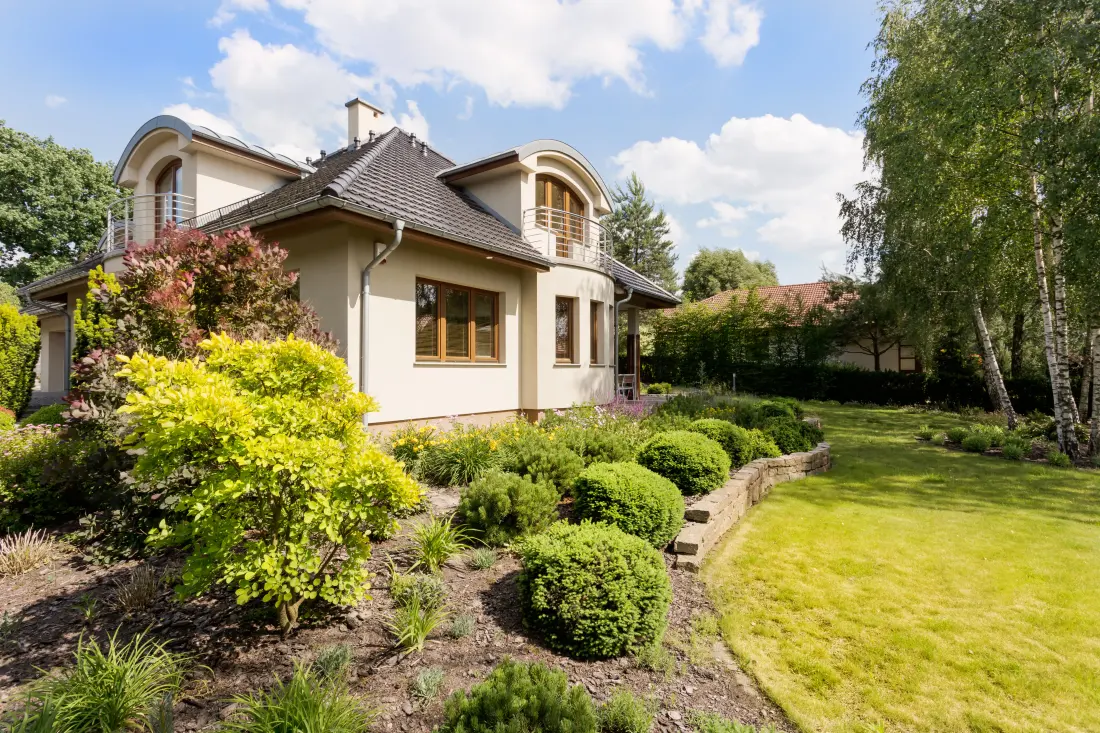 A well-maintained home with landscaped gardens